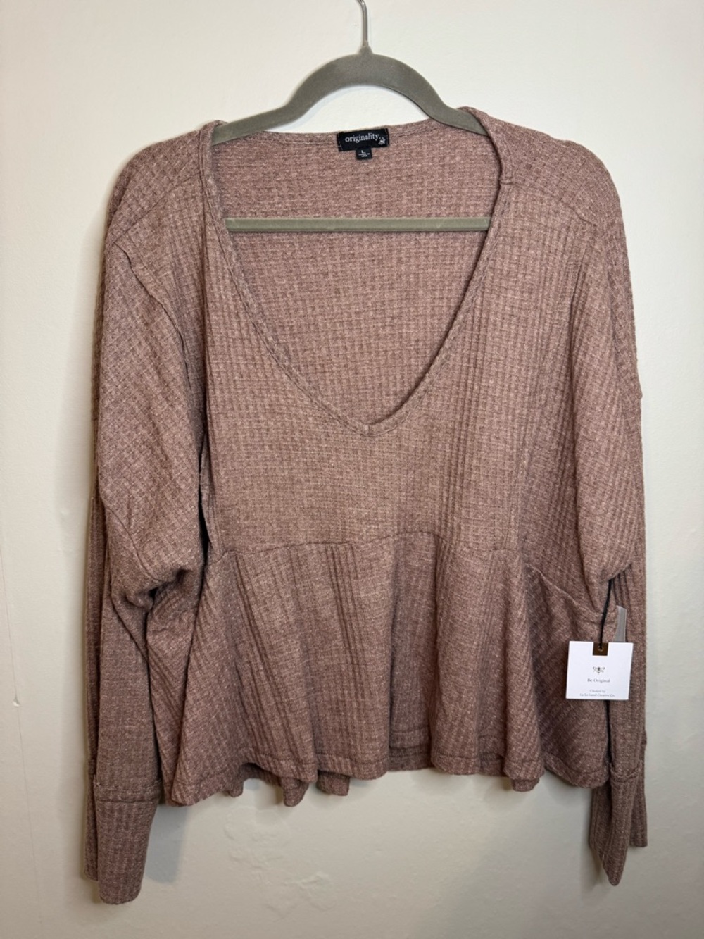 Originality Blush Peplum Ribbed V-Neck Long Sleeve Top